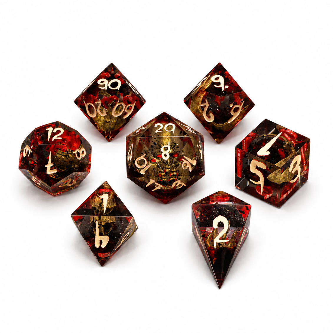 Set of polyhedral dice with red and black design on a white background